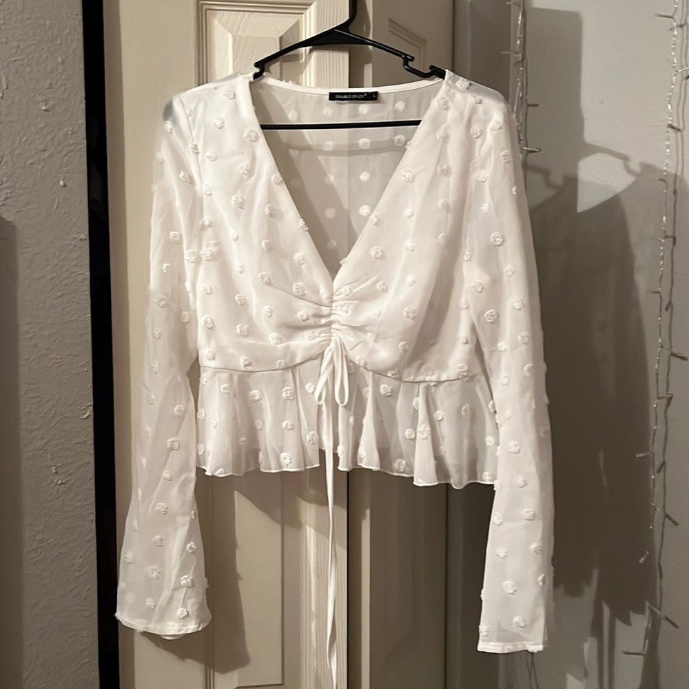 Large white blouse with white fluffy dots